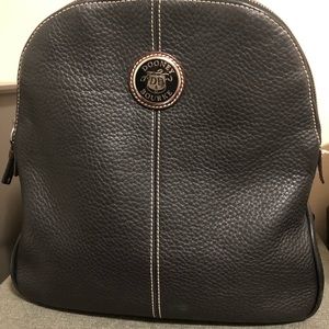VINTAGE DOONEY AND BOURKE ALL LEATHER BACKPACK.